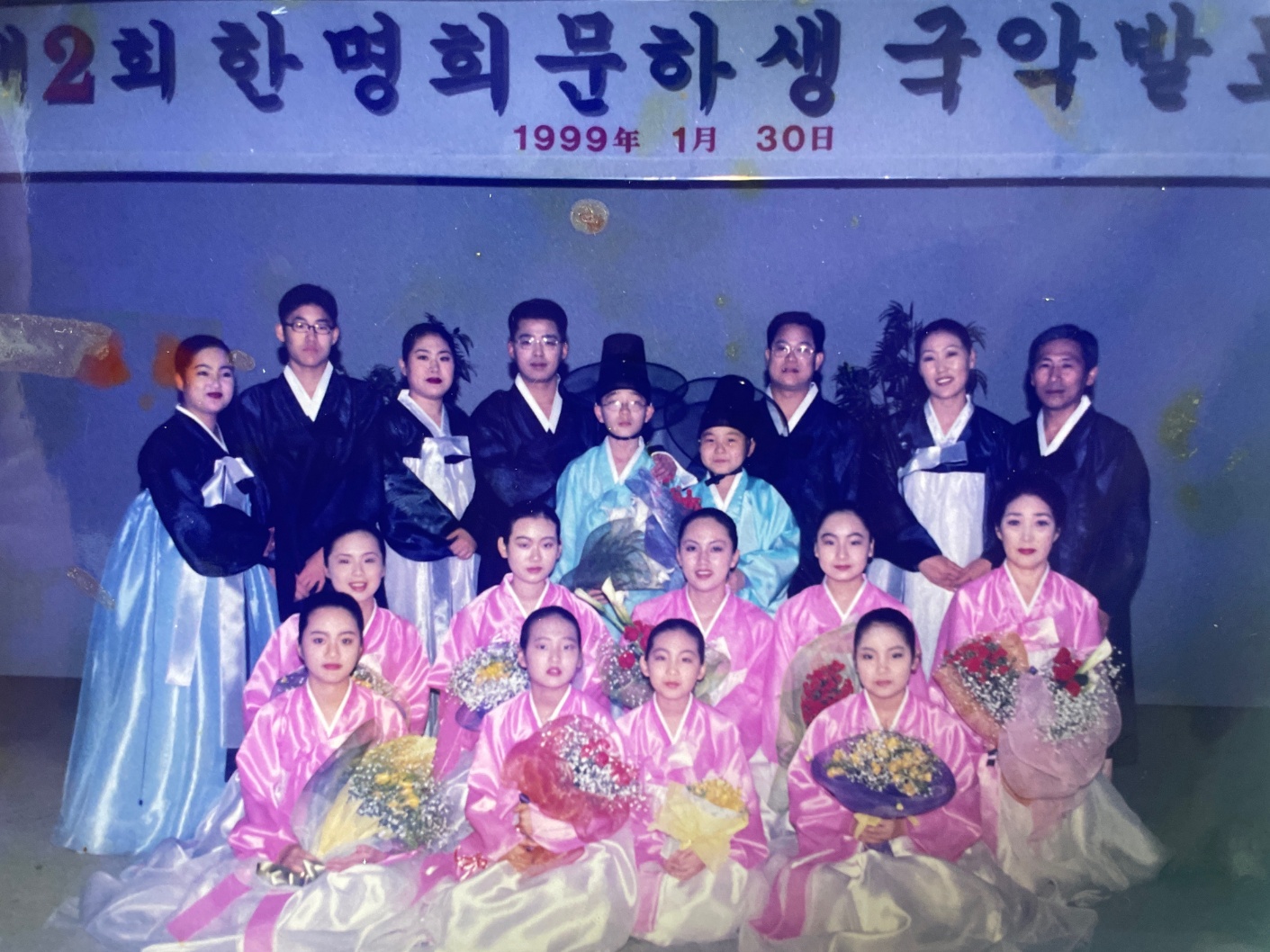 Rok Sim wearing a *gat* (갓), a traditional Korean hat